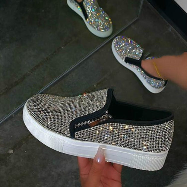 Casual, single-pedal, flat shoes with large rhinestones.