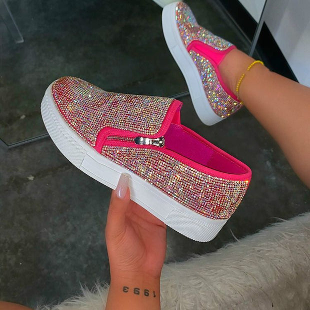Casual, single-pedal, flat shoes with large rhinestones.