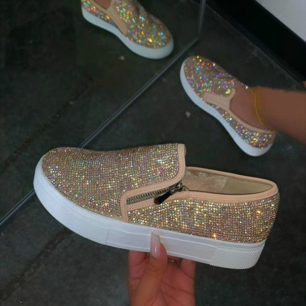 Casual, single-pedal, flat shoes with large rhinestones.