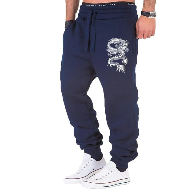 mens fashion casual dragon jogger pants with elastic waist and side buttons, styled for a casual streetwear look.