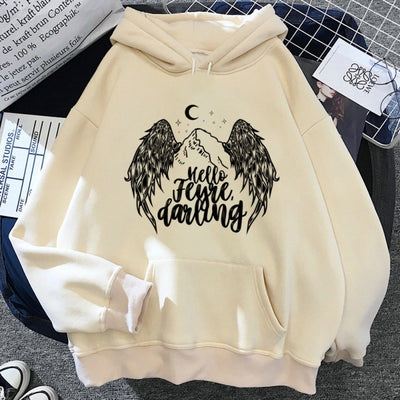 a white color hoodie with angel wings