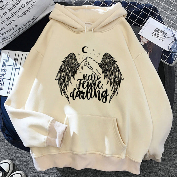 a white color hoodie with angel wings